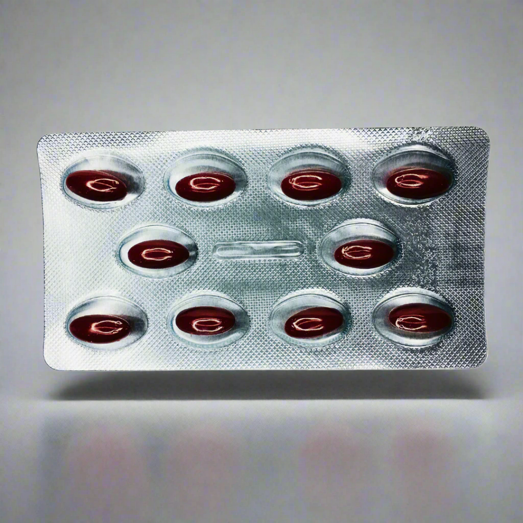 Silver blister pack with red circular objects on a white background